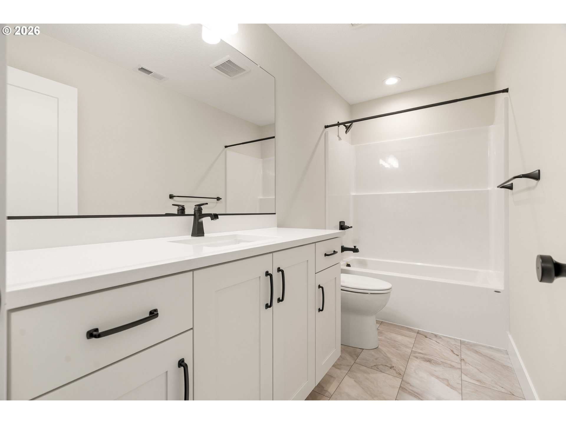 2803 Northwest 114th Terrace Portland, OR 97229 - Photo 20 of 22 a bathroom with a bathtub shower sink vanity and toilet