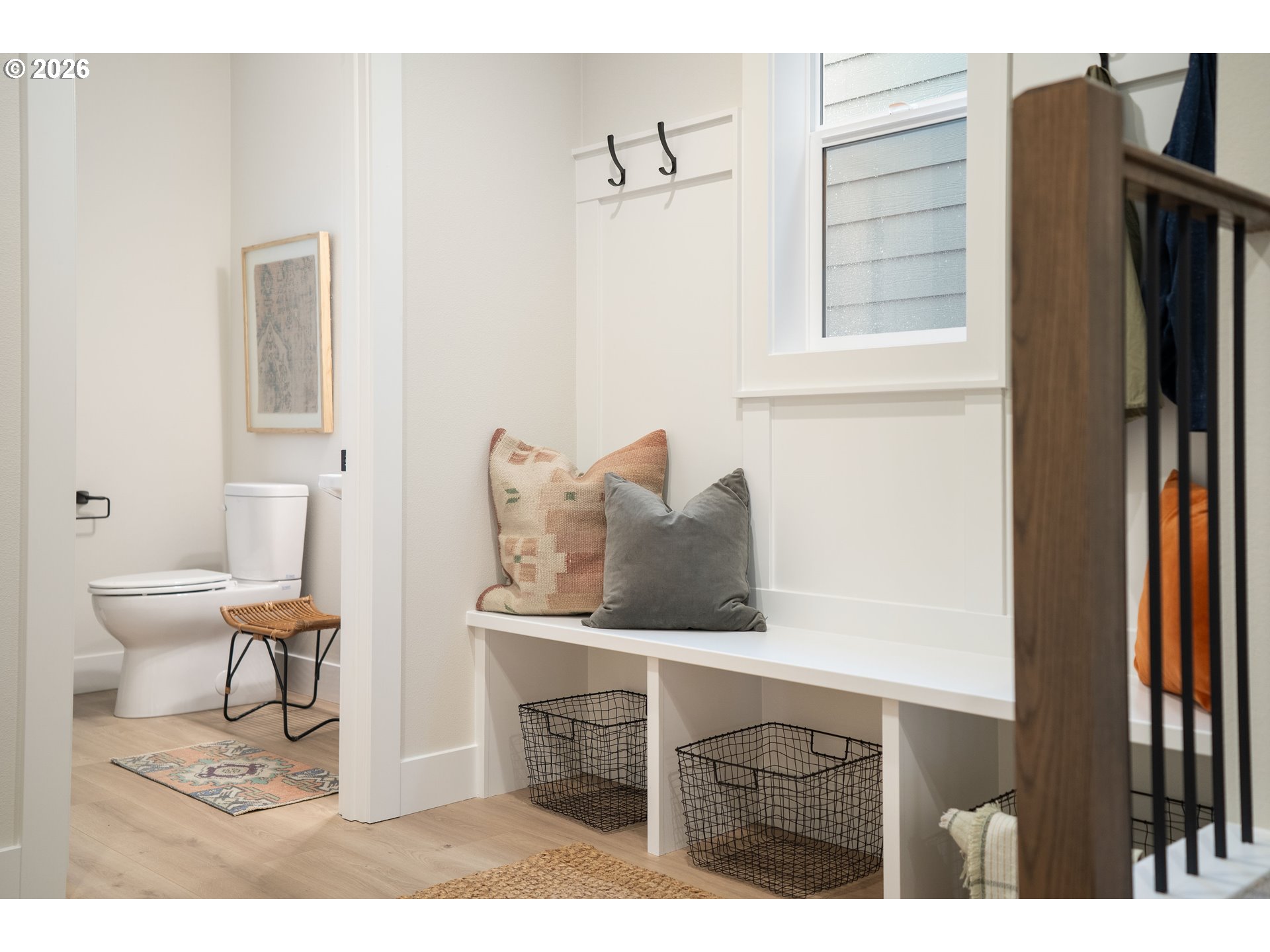 2803 Northwest 114th Terrace Portland, OR 97229 - Photo 4 of 22 a bathroom with a sink a toilet and a mirror