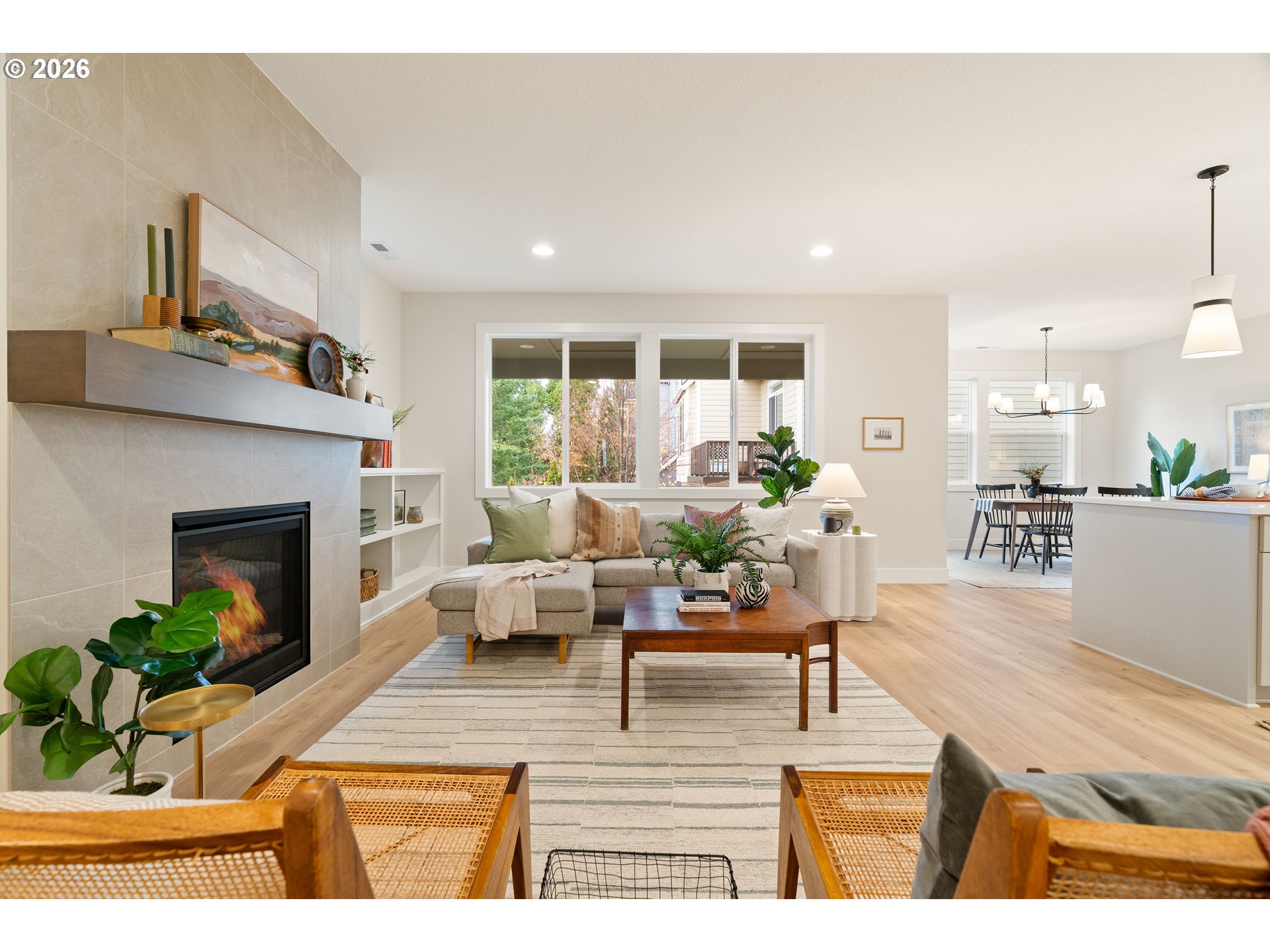 2803 Northwest 114th Terrace Portland, OR 97229 - Photo 7 of 22 a living room with furniture and a fireplace