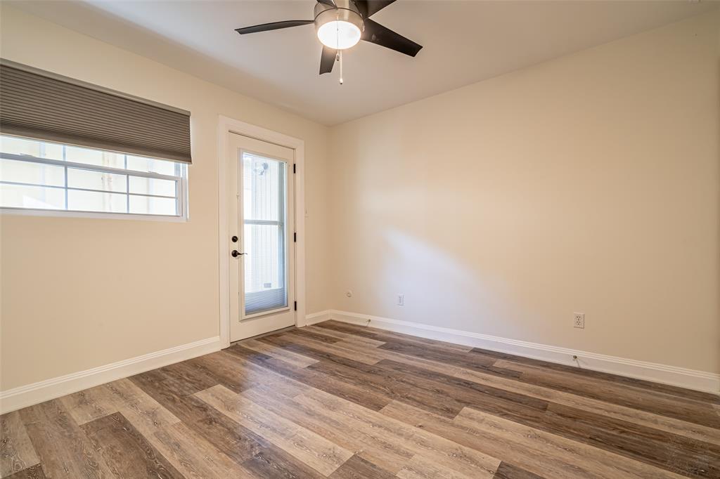 9999 Boat Club Road, Unit 207 Fort Worth, TX 76179 - Photo 24 of 32 an empty room with a window and a ceiling fan