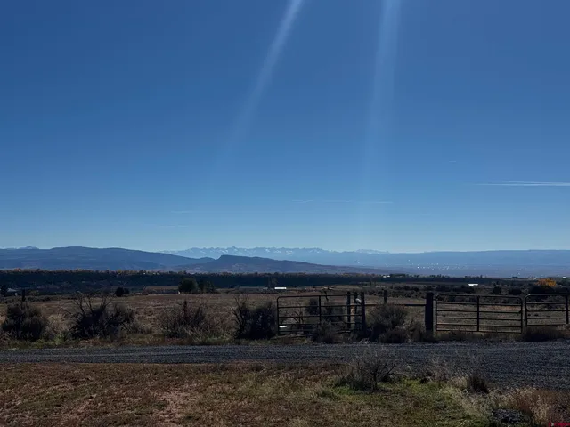 a view of balcony with sunset view
