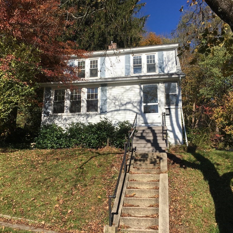 22 Rob Roy Road Worcester, MA 01602 - Photo 1 of 27 a front view of a house with a yard