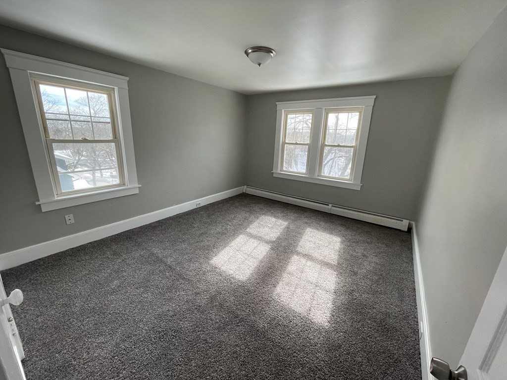 22 Rob Roy Road Worcester, MA 01602 - Photo 16 of 27 an empty room with a window