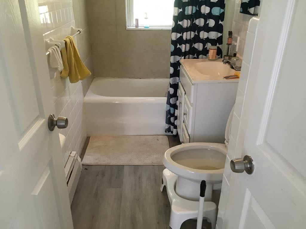 22 Rob Roy Road Worcester, MA 01602 - Photo 17 of 27 a bathroom with a sink toilet and shower