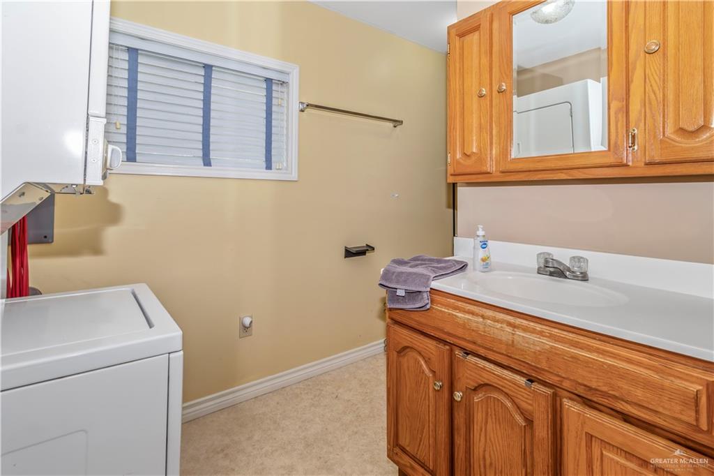 2800 Turner Road San Benito, TX 78586 - Photo 12 of 18 a utility room with dryer and washer