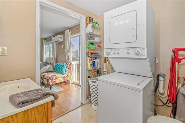 a utility room with dryer and washer
