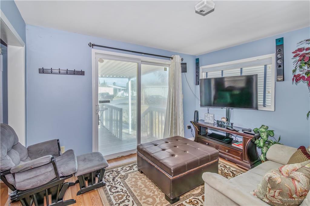 2800 Turner Road San Benito, TX 78586 - Photo 9 of 18 a living room with furniture and a flat screen tv