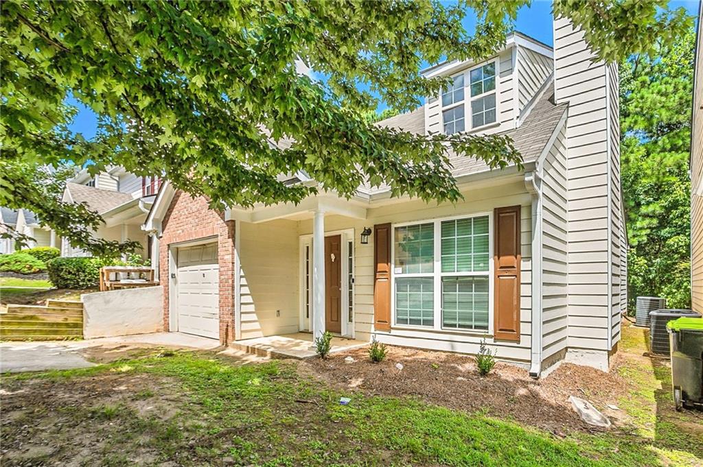 4611 Raven Wood Loop Union City, GA 30291 - Photo 3 of 24 front view of a house with a yard