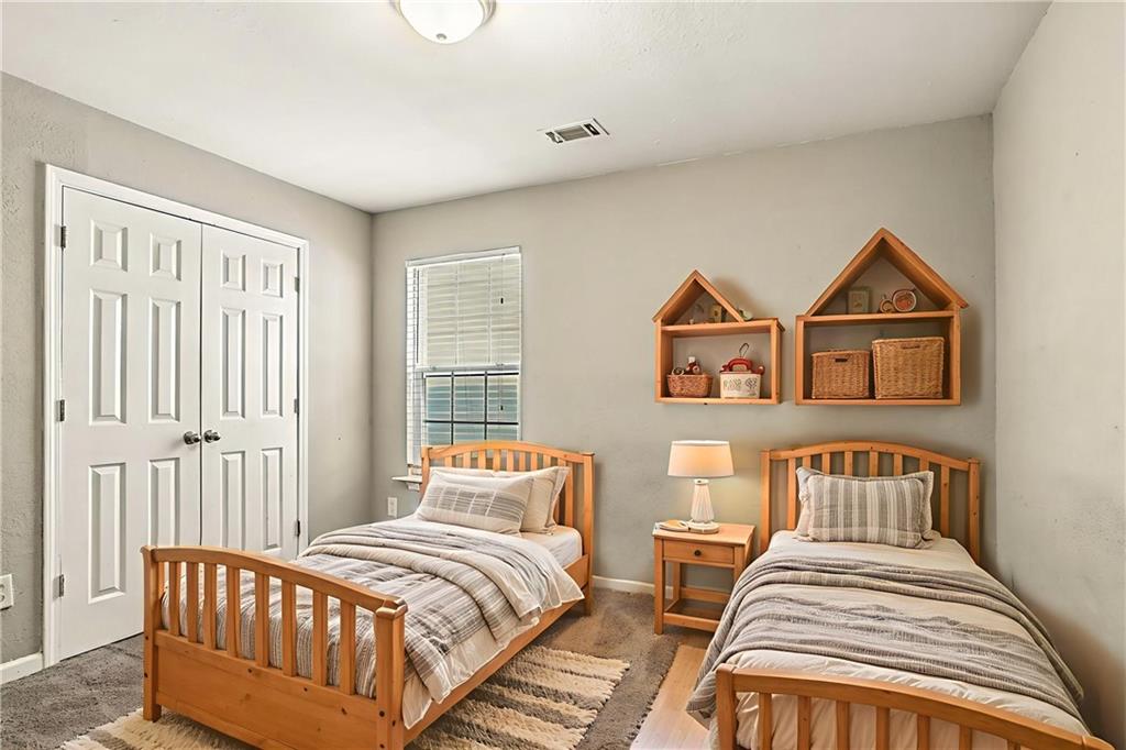 4611 Raven Wood Loop Union City, GA 30291 - Photo 6 of 24 a bedroom with bed and a window