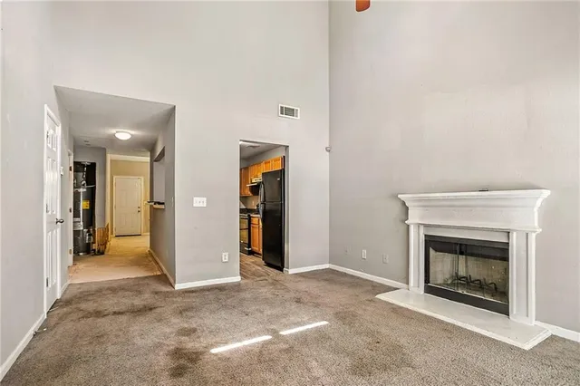 a view of a livingroom with a fireplace