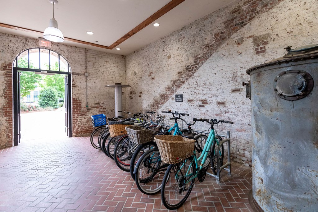 1201 Front Avenue, Unit 509 Columbus, GA 31901 - Photo 3 of 41 a living room with furniture a window and a table