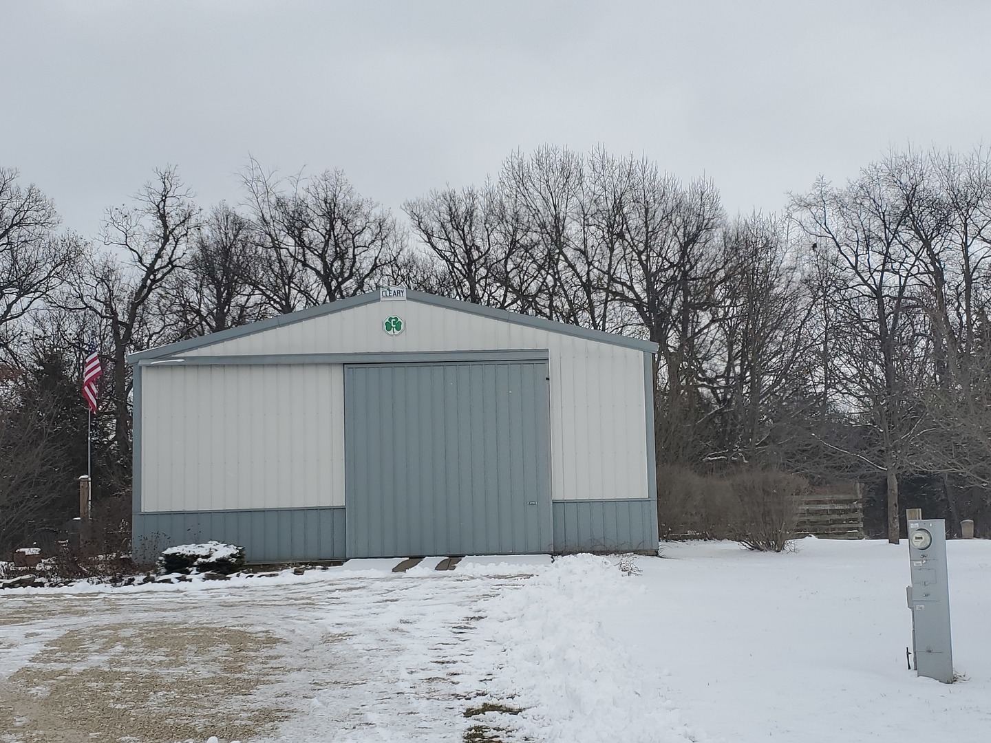 3538 East 2179th Road Ottawa, IL 61350 - Photo 3 of 28 a front view of a house with a yard covered in snow