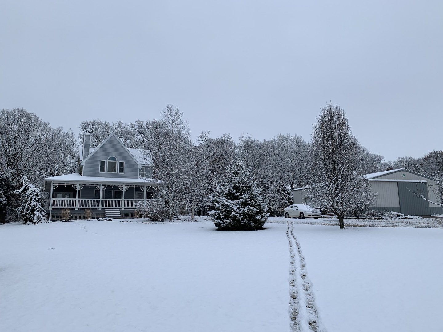 3538 East 2179th Road Ottawa, IL 61350 - Photo 28 of 28 a view of a house with a yard covered in snow