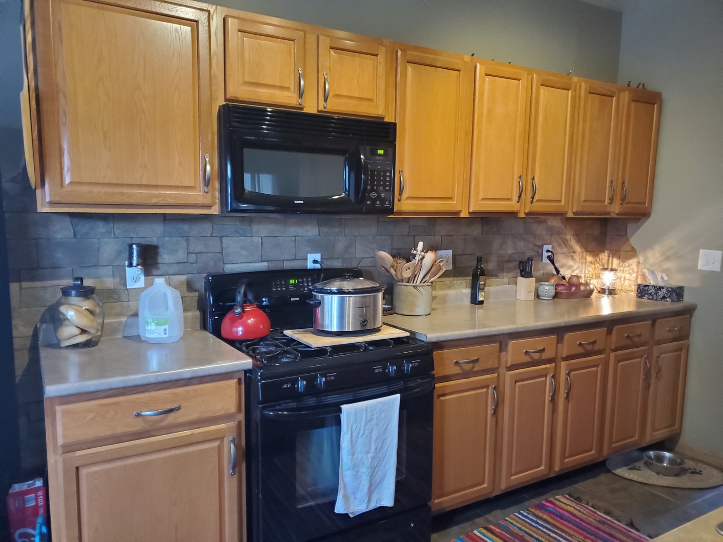 3538 East 2179th Road Ottawa, IL 61350 - Photo 6 of 28 a kitchen with stainless steel appliances granite countertop a sink stove and microwave