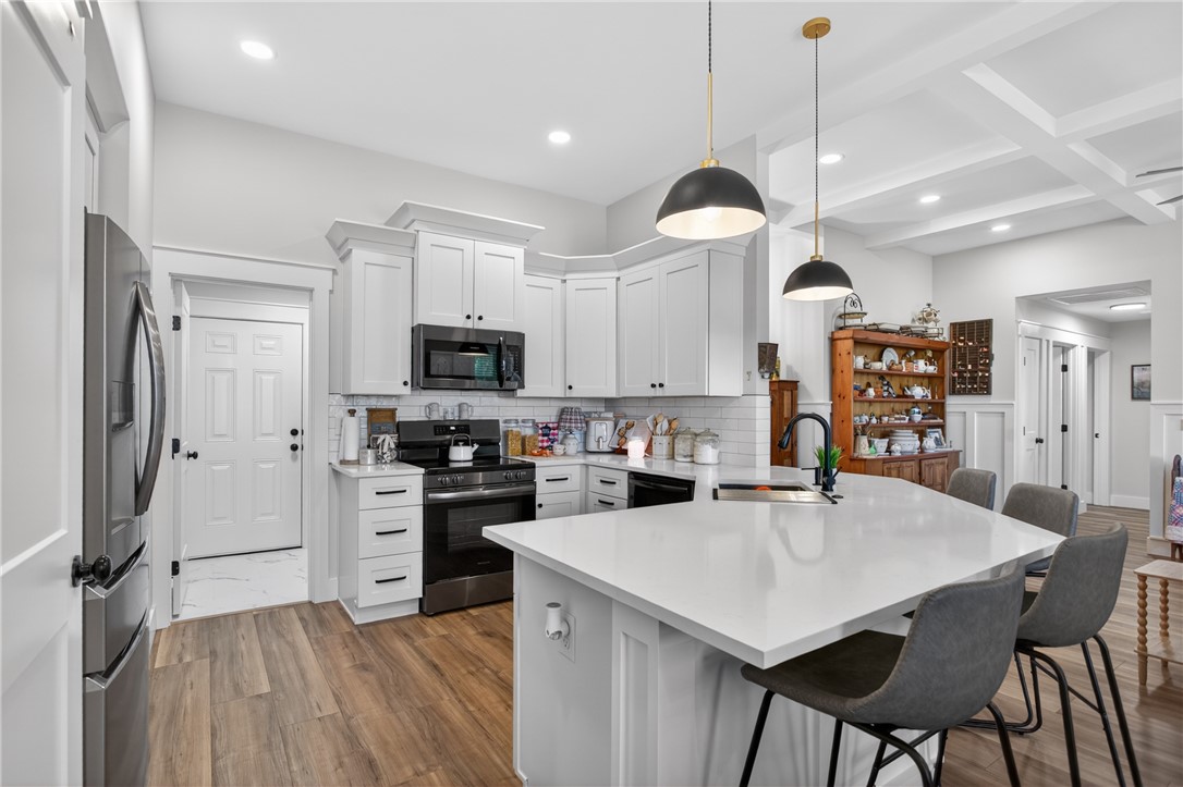 106 Bolt Road Townville, SC 29689 - Photo 6 of 33 A chef's dream kitchen offers a central island and contemporary fixtures, perfect for culinary adventures.