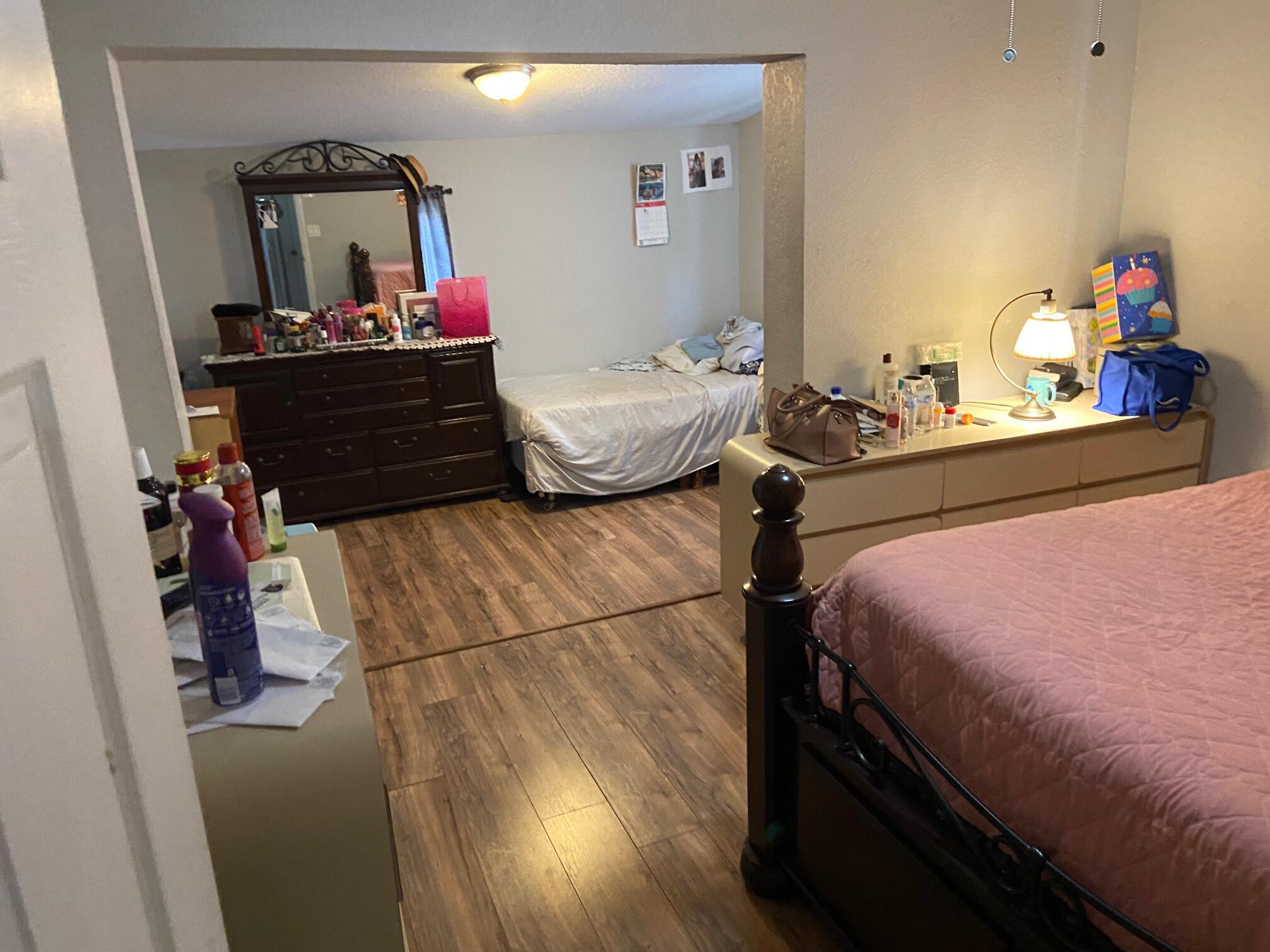 520 Southwest 15th Terrace Delray Beach, FL 33444 - Photo 2 of 4 a bed room with two bed and a mirror