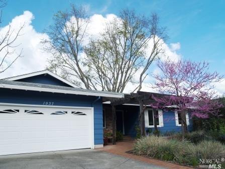1937 Neotomas Avenue Santa Rosa, CA 95405 - Photo 1 of 1 Great landscaping design greets you as you enter the residence. Grape arbor now filling the overhead and landscaping just busting out to say hello!