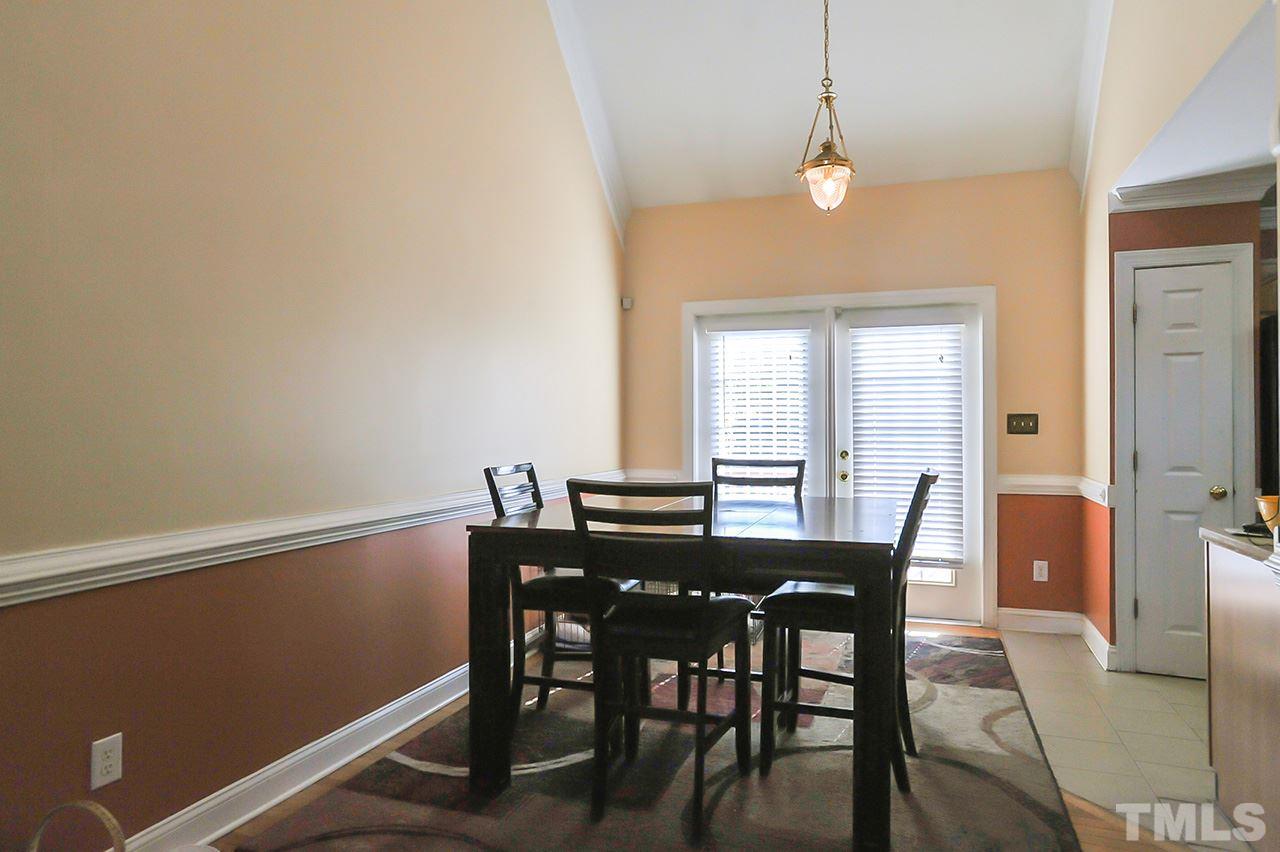 4604 Old Poole Road Raleigh, NC 27610 - Photo 4 of 14 a view of a dining room with furniture and window
