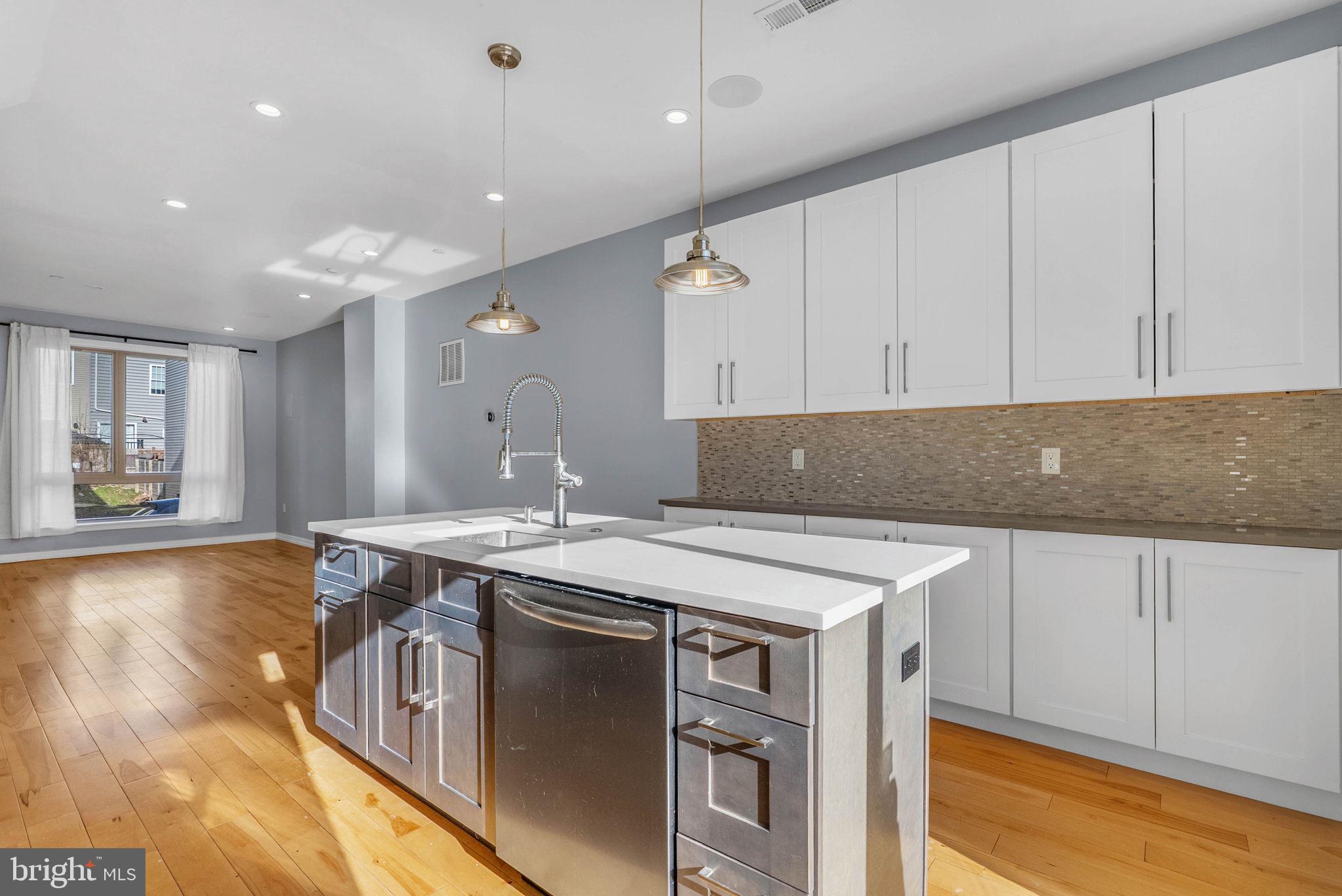1912 Gerritt Street Philadelphia, PA 19146 - Photo 13 of 40 a kitchen with a sink and cabinets