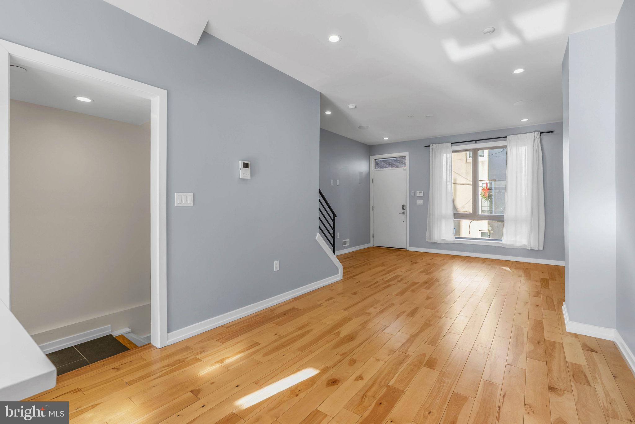 1912 Gerritt Street Philadelphia, PA 19146 - Photo 9 of 40 wooden floor in an empty room with a window