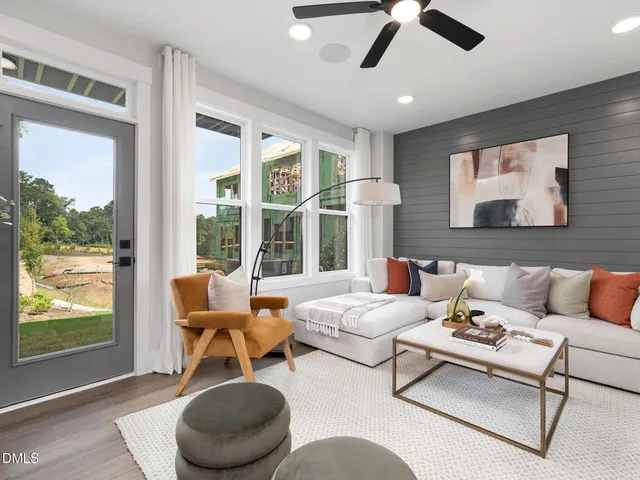 a picture of a room with a floor to ceiling window