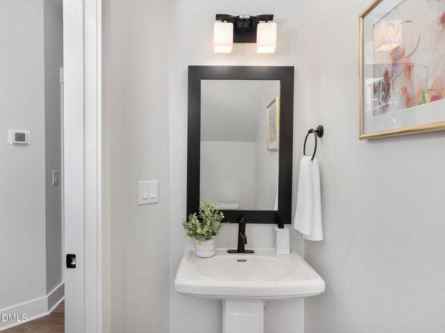 a picture of a bathroom with a window