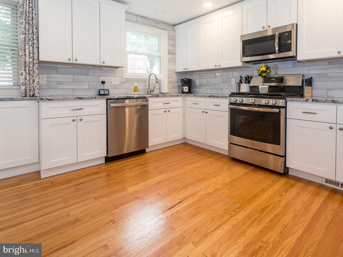 103 Haller Road Ridley Park, PA 19078 - Photo 8 of 26 Updated Kitchen with Stunning Tile Backsplash