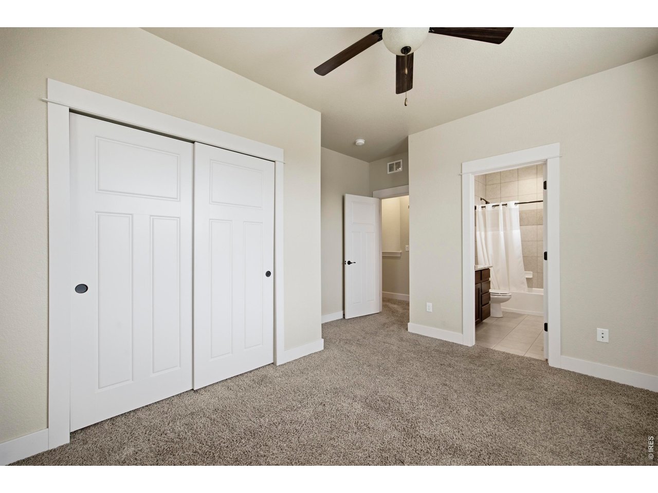 2163 Scarecrow Road Fort Collins, CO 80525 - Photo 19 of 25 Closet & Attached Bathroom