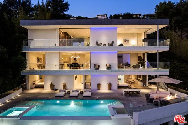 a view of house with outdoor space and seating area