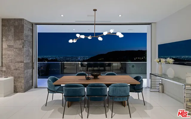 a view of a swimming pool with lounge chair