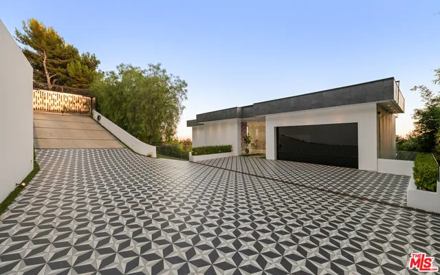 a view of a balcony and chairs