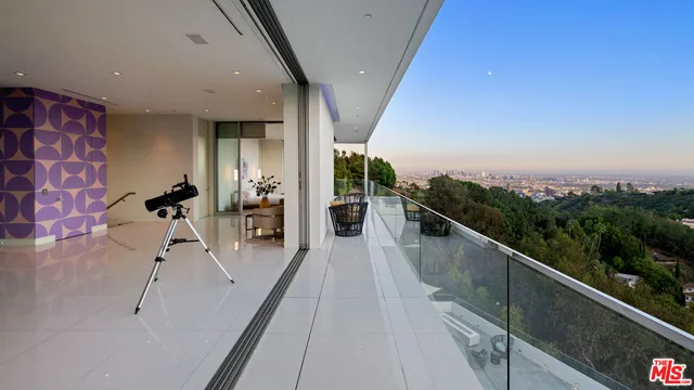 a bathroom with a sink mirror and vanity
