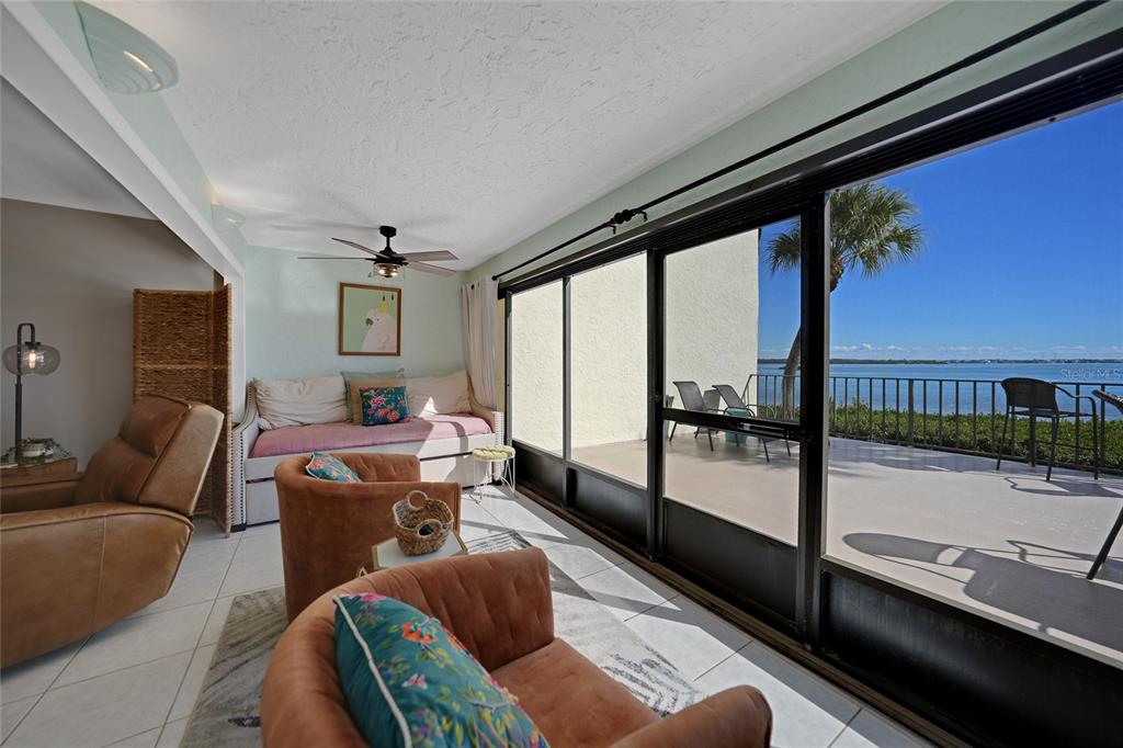 1591 Beach Road, Unit 202 Englewood, FL 34223 - Photo 26 of 46 a living room with furniture