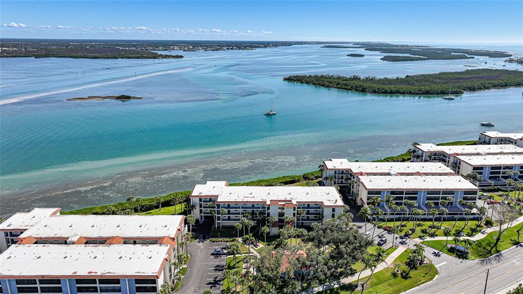 1591 Beach Road, Unit 202 Englewood, FL 34223 - Photo 45 of 46 a view of a terrace with chairs