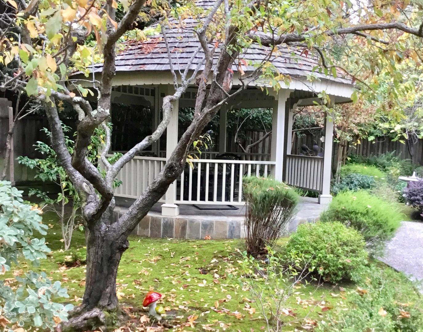 126 Atherton Avenue Atherton, CA 94027 - Photo 14 of 17 a view of a house with a yard and plants