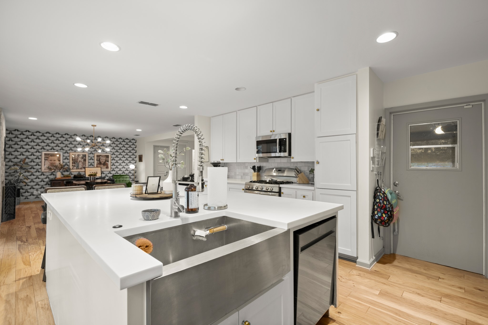 8600 Azalea Trail Austin, TX 78759 - Photo 14 of 26 a kitchen with stainless steel appliances granite countertop a sink a stove and a refrigerator