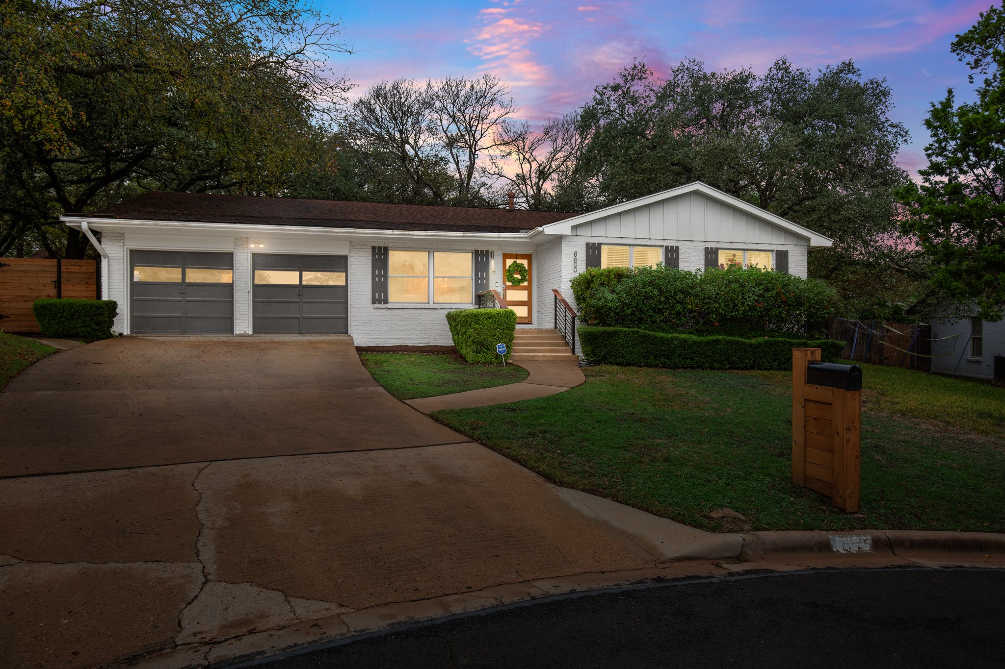 8600 Azalea Trail Austin, TX 78759 - Photo 15 of 26 a front view of a house with a yard