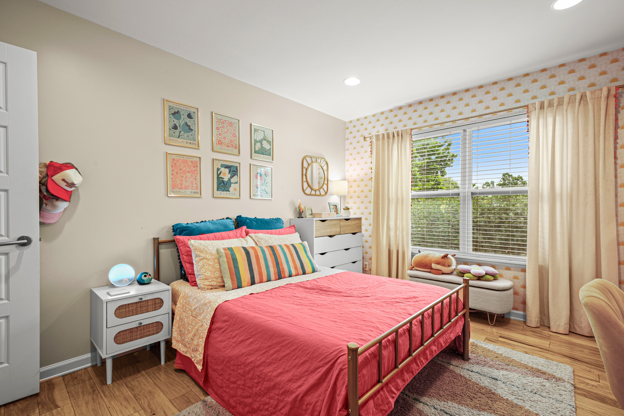 8600 Azalea Trail Austin, TX 78759 - Photo 18 of 26 a bedroom with a bed and wooden floor