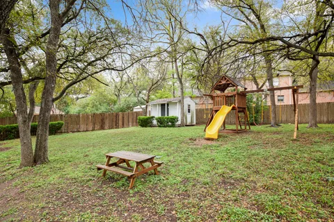 a view of yard with tree s
