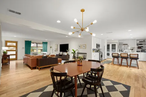 a view of a dining room with furniture