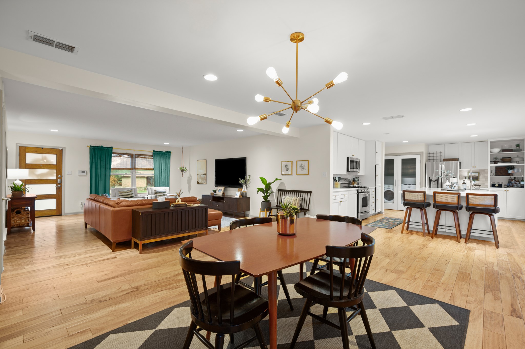 8600 Azalea Trail Austin, TX 78759 - Photo 4 of 26 a view of a dining room with furniture