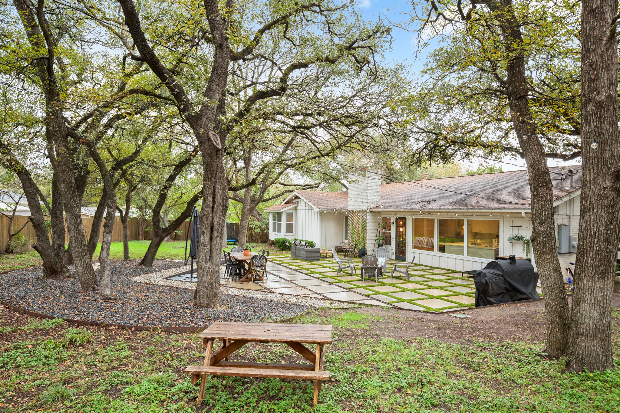 8600 Azalea Trail Austin, TX 78759 - Photo 7 of 26 a front view of a house with garden