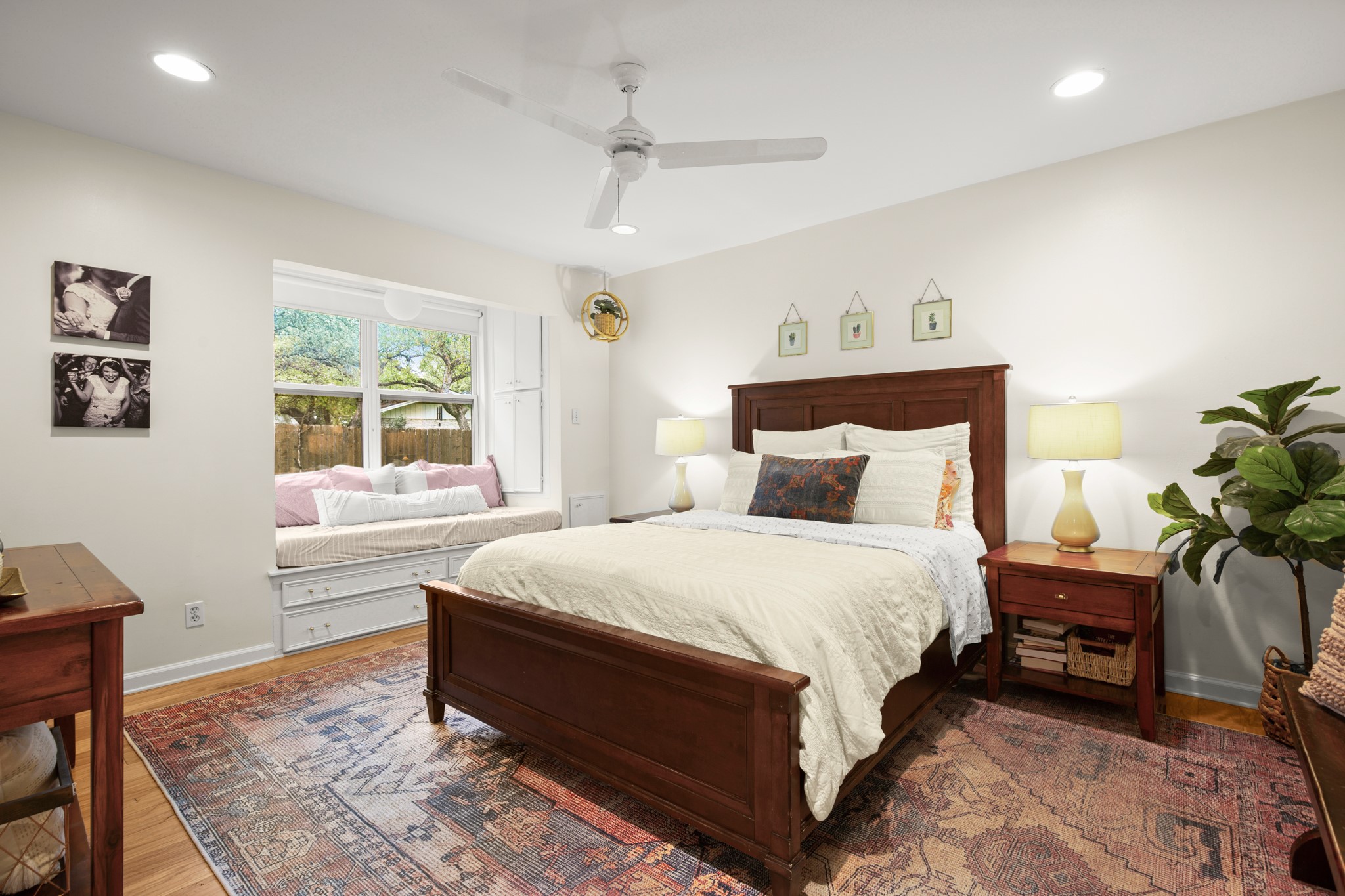 8600 Azalea Trail Austin, TX 78759 - Photo 9 of 26 a spacious bedroom with a bed and a window