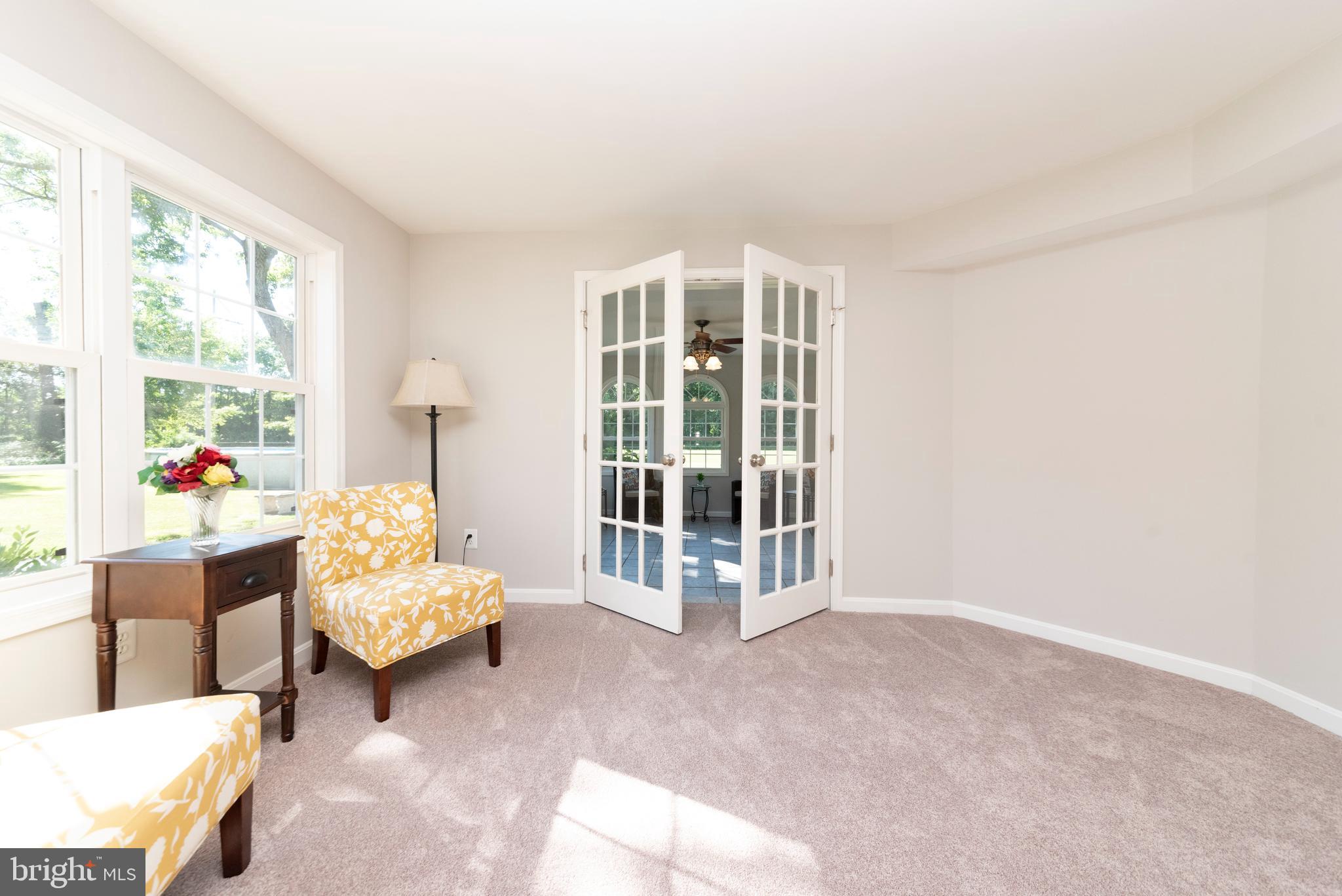 1007 Camp Road Denton, MD 21629 - Photo 25 of 58 Living Room Open to Sunroom