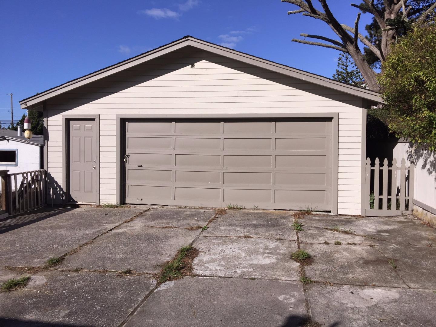 333 Brighton Road Pacifica, CA 94044 - Photo 6 of 9 a front view of a house with garage