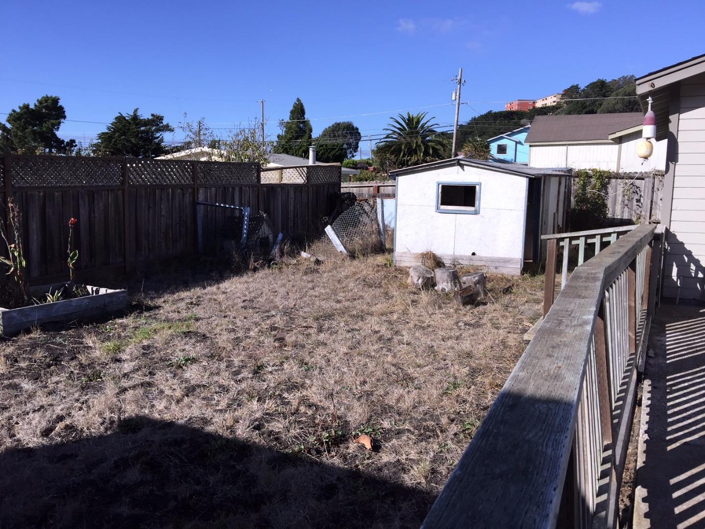 333 Brighton Road Pacifica, CA 94044 - Photo 9 of 9 a view of a backyard with sitting area