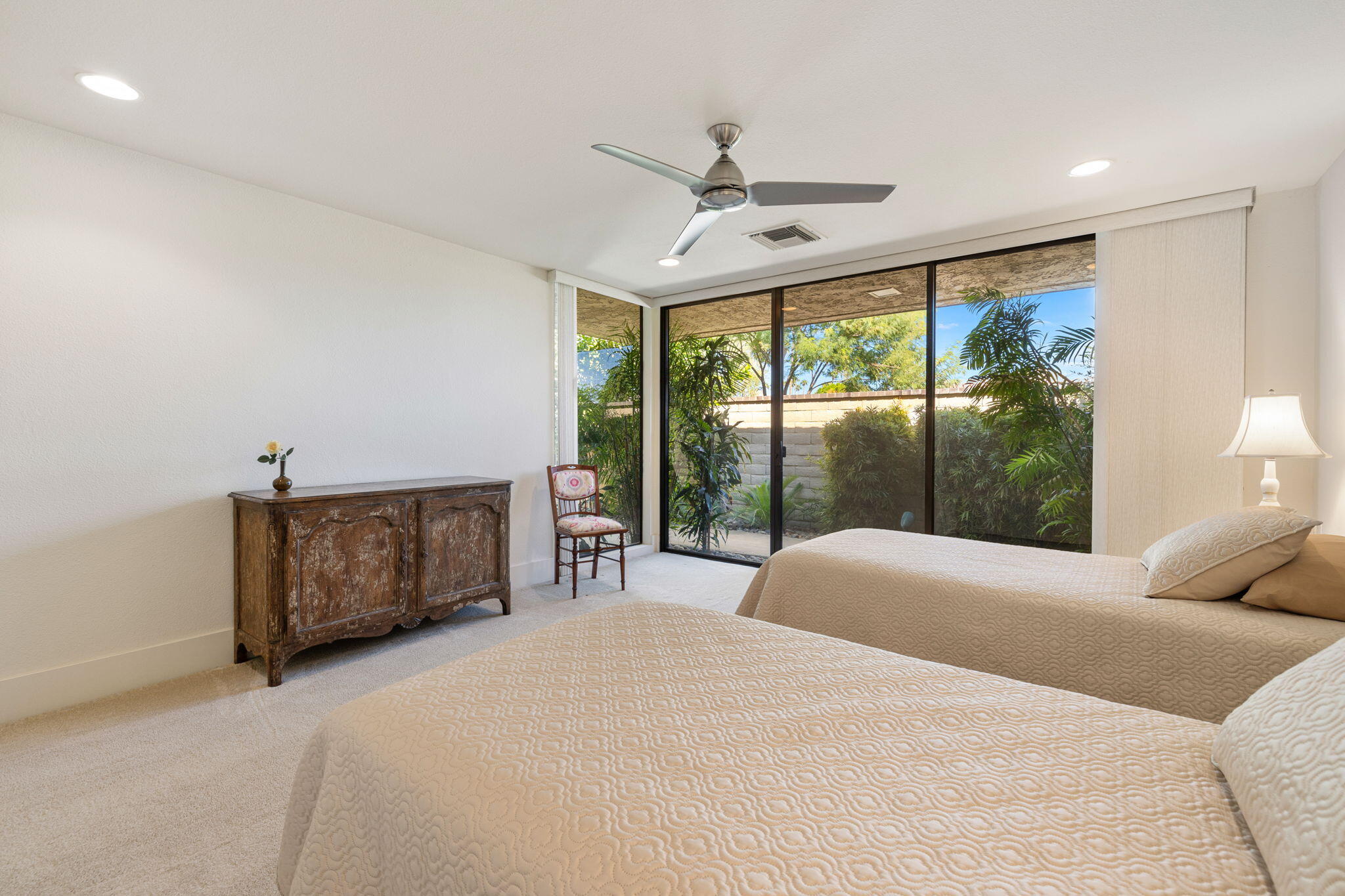 15 Reed Court Rancho Mirage, CA 92270 - Photo 36 of 53 a bedroom with a bed and a large window
