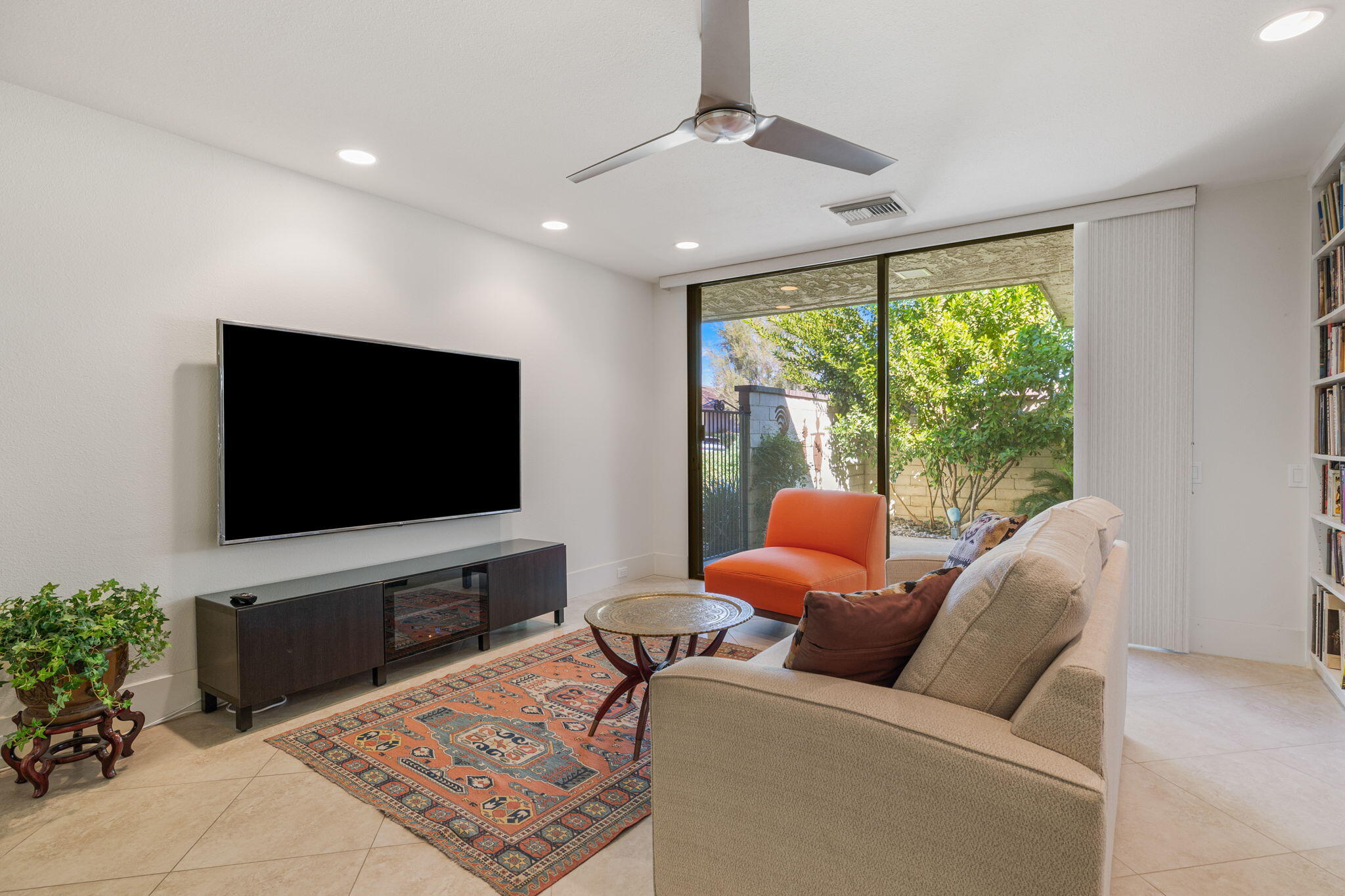 15 Reed Court Rancho Mirage, CA 92270 - Photo 41 of 53 a living room with furniture and a flat screen tv