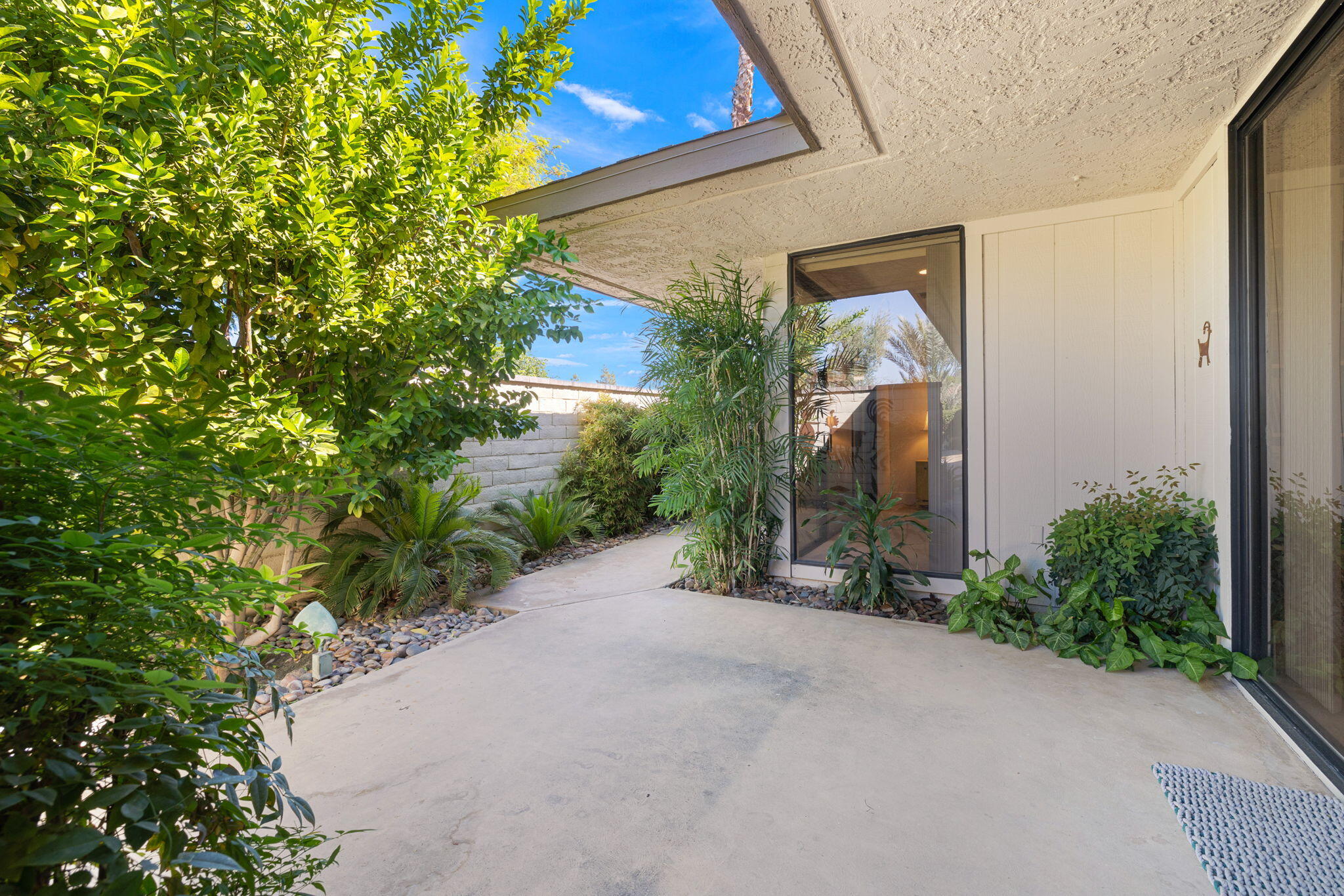 15 Reed Court Rancho Mirage, CA 92270 - Photo 50 of 53 a view of a house with a yard