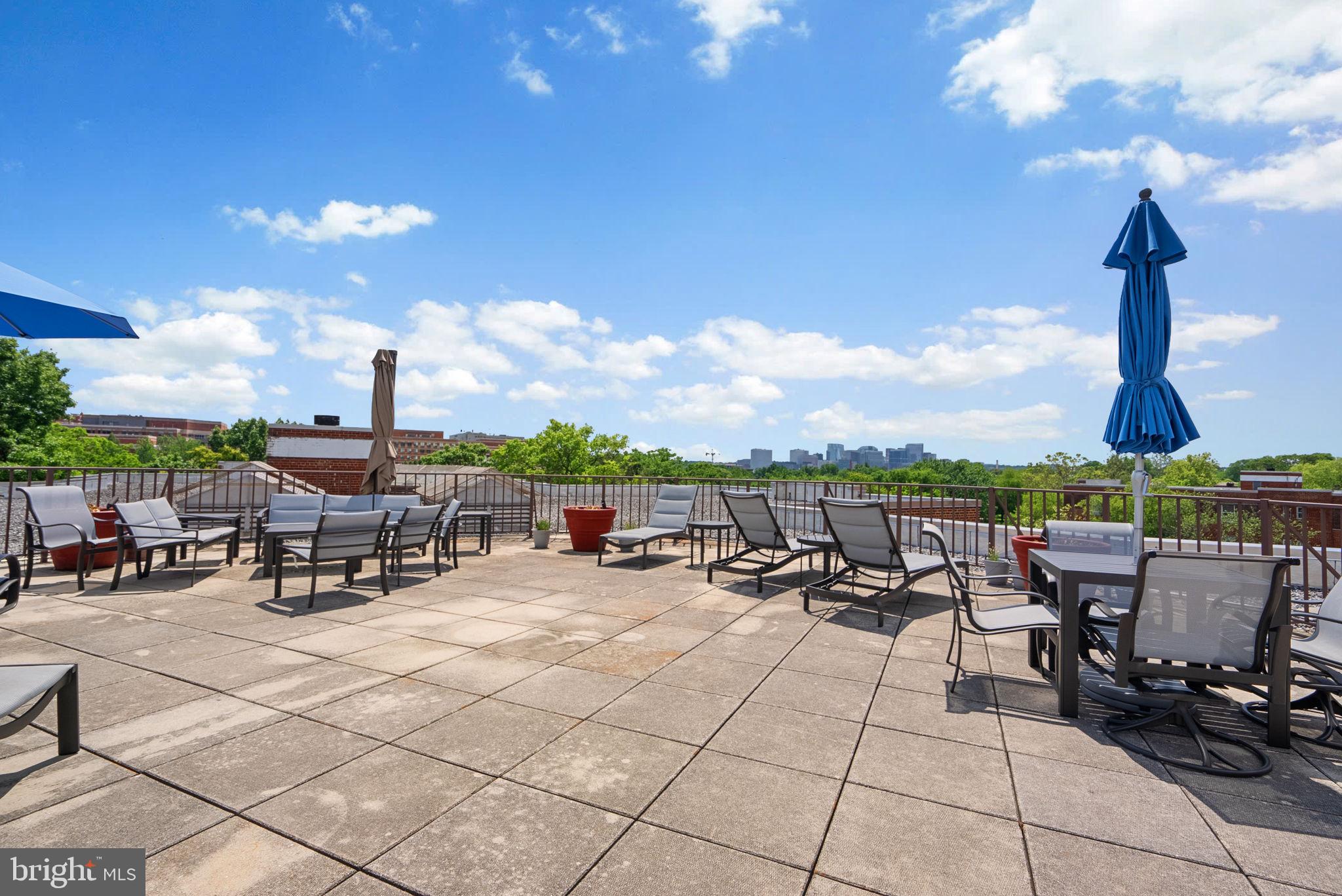 2500 Q Street Northwest, Unit 524 Washington, DC 20007 - Photo 40 of 50 a view of a terrace with chairs